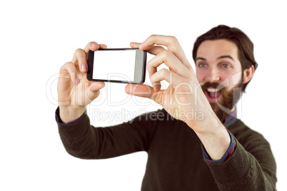 Hipster using his seflie stick