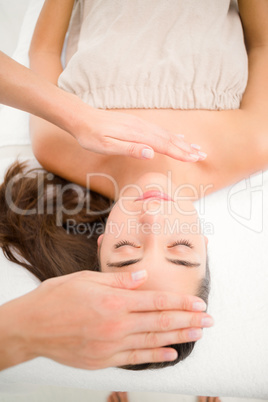 Beautiful young woman on massage table