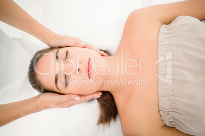 Beautiful young woman on massage table