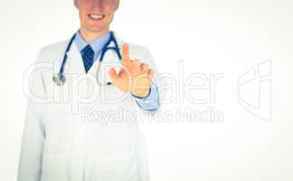 Smiling doctor writing with fingers