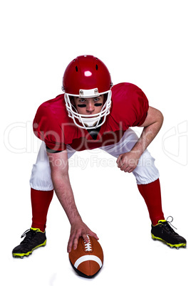 American football player in attack stance