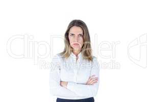 Businesswoman looking sad with her arms crossed