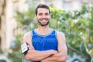 Portrait of an happy handsome athlete