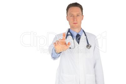 Serious doctor writing with fingers Serious doctor writing with fingers