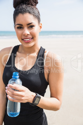 Fit woman wearing smart watch