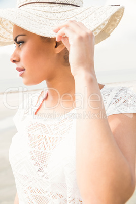 Stylish girl looking to the sea