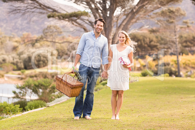 Cute couple on date walking in the park