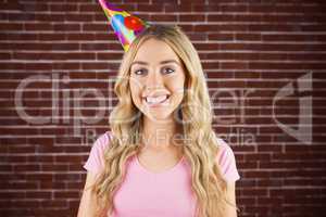 Portrait of a beautiful woman with party hat