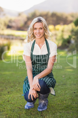 Smiling farmer woman looking at the camera