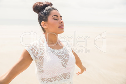 Stylish girl with arms outstretched