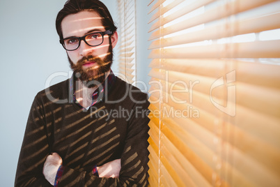 Hipster businessman smiling at camera