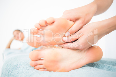 Close-up of a woman receiving foot massage