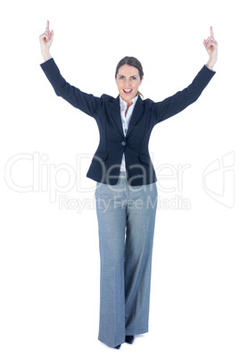 Portrait of a businesswoman doing a victory pose