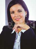 Confident businesswoman looking at camera
