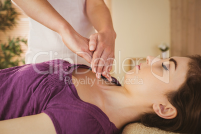 Young woman having a reiki treatment