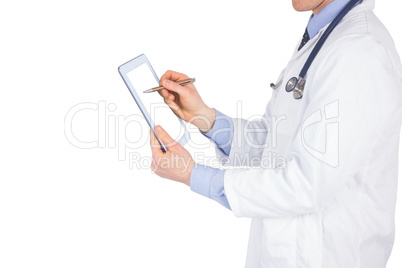 Doctor scrolling on a digital tablet