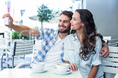 Young happy couple making a selfie