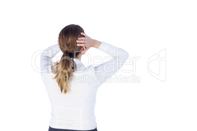 Stressed businesswoman with hands on her head