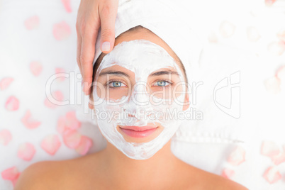 Attractive woman receiving treatment at spa center