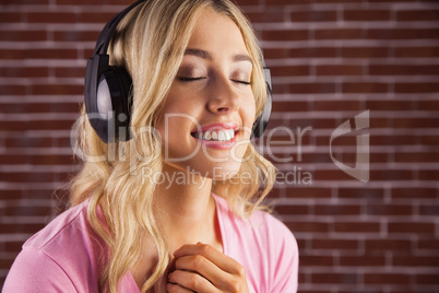 Close up of a woman listening to music