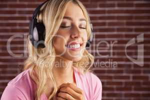 Close up of a woman listening to music