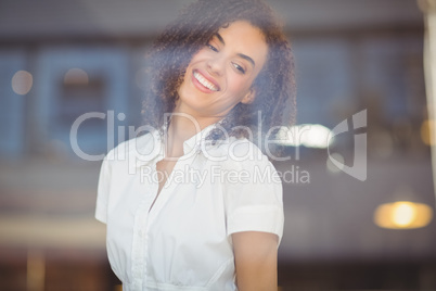 Carefree woman looking through the window