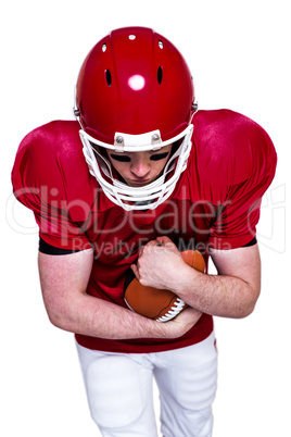 American football player running with the ball