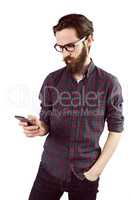 Handsome hipster using his phone