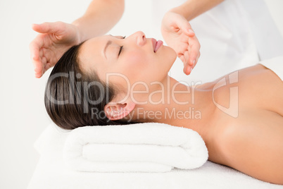 Woman receiving an alternative therapy