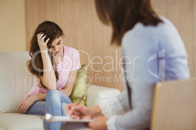 Therapist listening to her patient