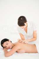 Woman in an acupuncture therapy