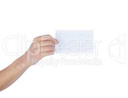 A hand holding a blank card