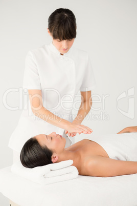 Woman receiving an alternative therapy