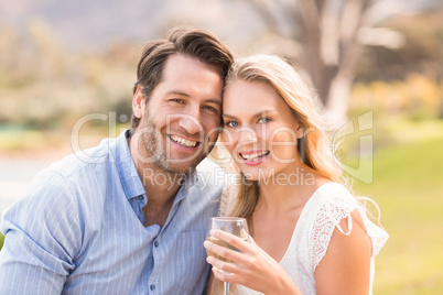 Cute couple on date looking at the camera