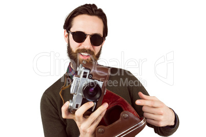 Hipster using his vintage camera