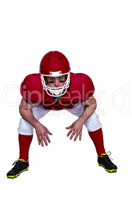 American football player in attack stance
