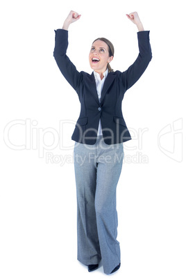 Businesswoman cheering with arms up Businesswoman cheering with arms up