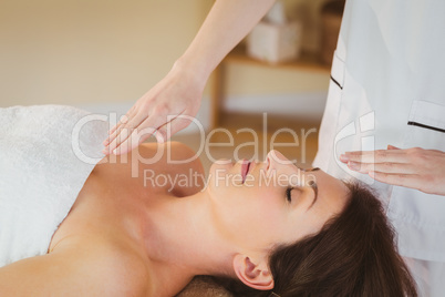 Young woman having a reiki treatment