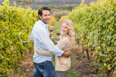 Young happy couple looking at the camera