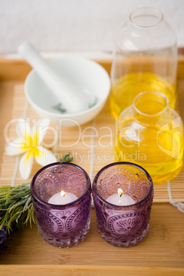 Massage tray with candles and oil