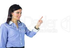 Businesswoman standing and pointing