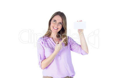Portrait of a beautiful casual businesswoman showing a sign