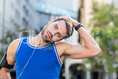 An handsome athlete looking away