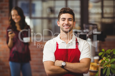 Handsome waiter with arms crossed Handsome waiter with arms crossed