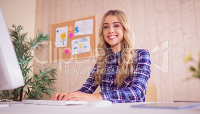 Pretty casual worker at her desk