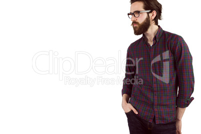 Handsome hipster with hands in pockets