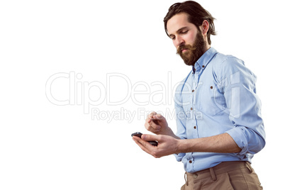 Stylish hipster sending a text