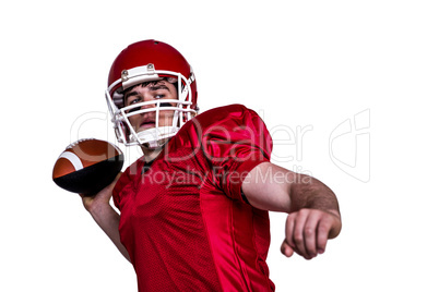 American football player throwing a ball