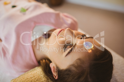 Young woman at crystal healing session