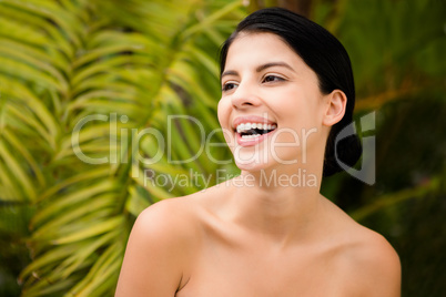 Laughing woman preparing herself for spa day